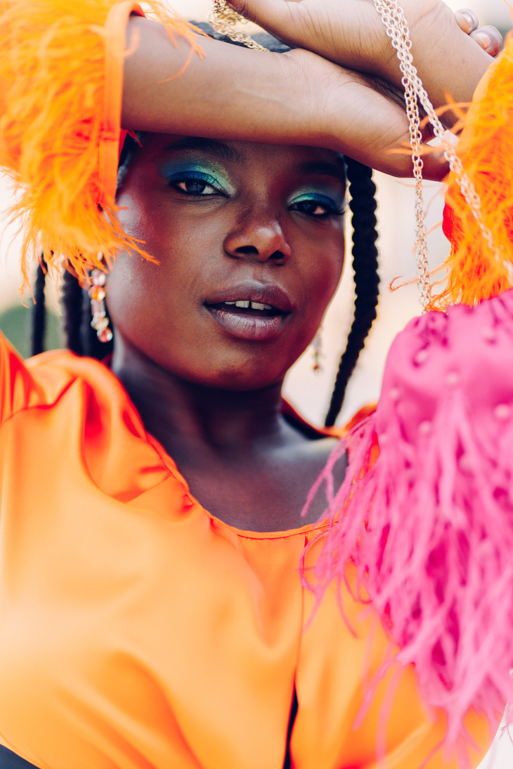 Stylish Woman in Bright Clothes in the City